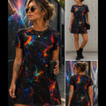 A woman modeling a short-sleeve mini dress with a black base and a vivid multicolor galaxy print in blue, orange, red, and purple. The image is a collage showing three views: a large front view, a full-body front view, and a back view, set against an urban street backdrop.