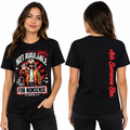 A woman modeling a black graphic T-shirt shown from both front and back against a plain white background. The front features a large red, white, and brown graphic with text, and the back has a vertical red graphic.