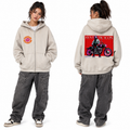 A model is shown from both the front and back wearing a light beige zip-up hoodie. The front features a circular pink and yellow graphic on the left chest, and the back features a large graphic print with a red background, a motorcycle, and the text 'SYNTHETIC ICON'.