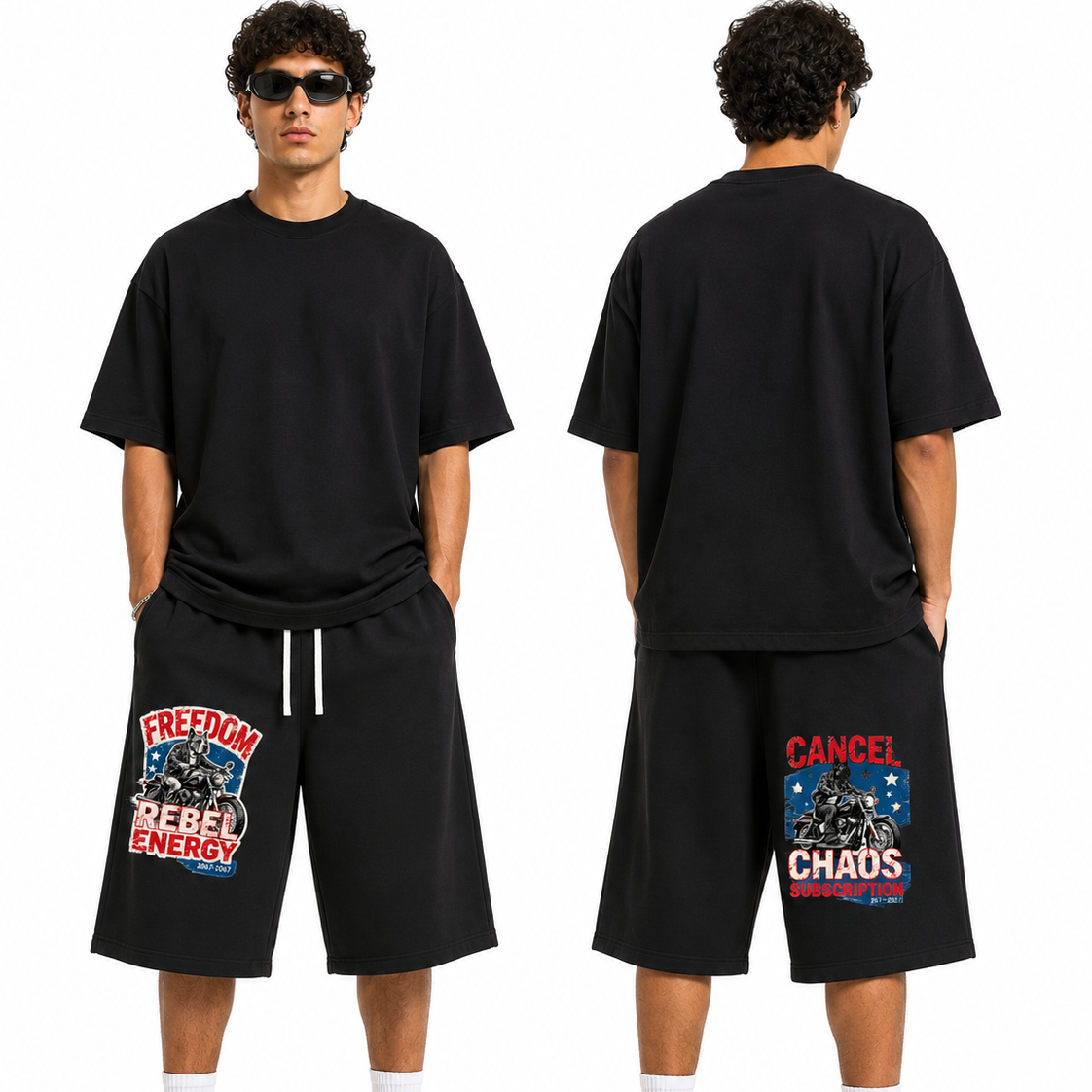 A model shown from the front and back wearing a black oversized t-shirt and black shorts with graphic prints. The front view shows a graphic on the left leg reading 'FREEDOM Rebel Energy' and the back view shows a graphic on the right leg reading 'CANCEL CHADS REBEL ENERGY'.